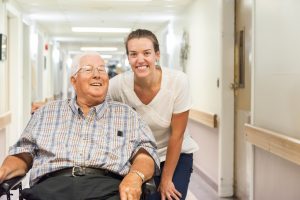 smiling resident and care worker